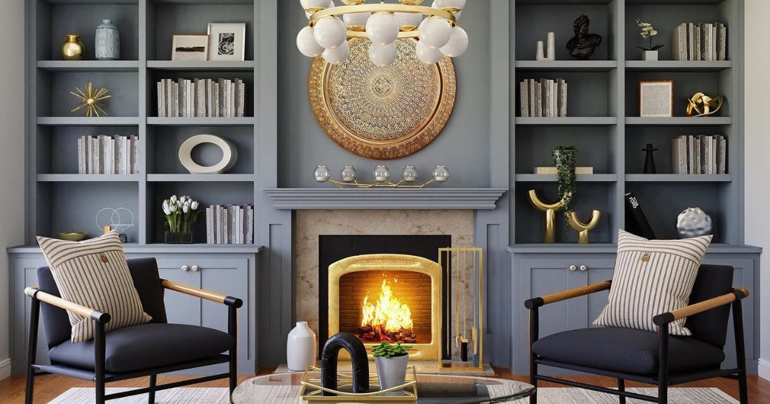 A cozy living room with book shelves and a fireplace with a winter area rug and two couches in front of the fireplace.