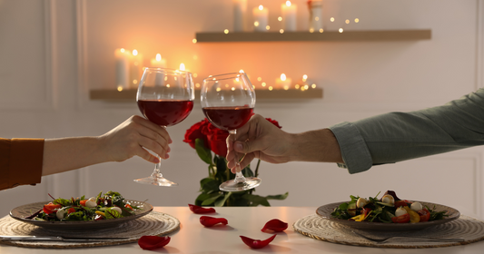 A couple at home dinner date in Valentine's Day with a decorated home. 