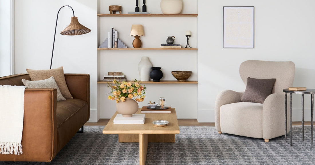 Cozy living room with a Rainier Cottage washable area rug, neutral tones, and warm accents.