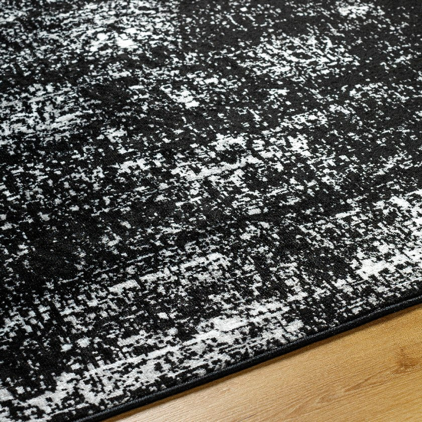 Yevette Traditional Black Area Rug