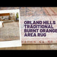 Orland Hills Traditional Burnt Orange Area Rug