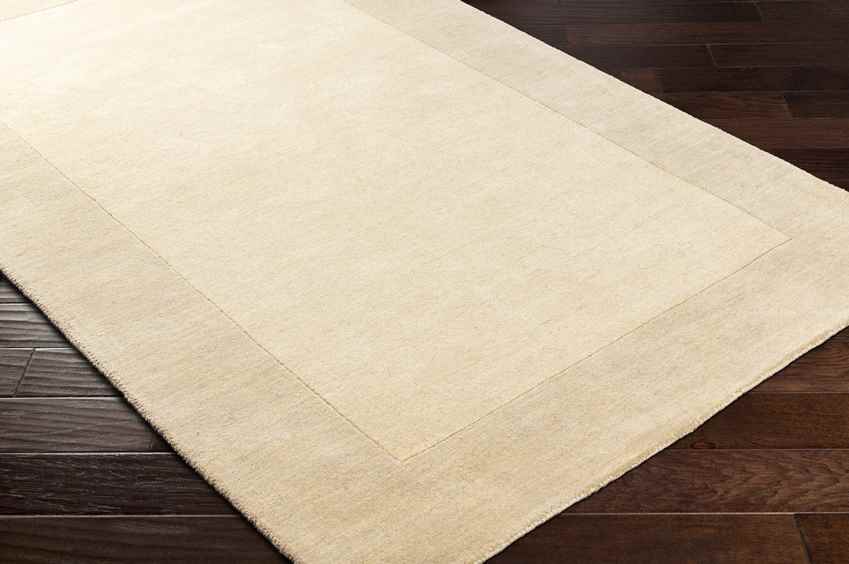 Reims Solid and Border Cream Area Rug