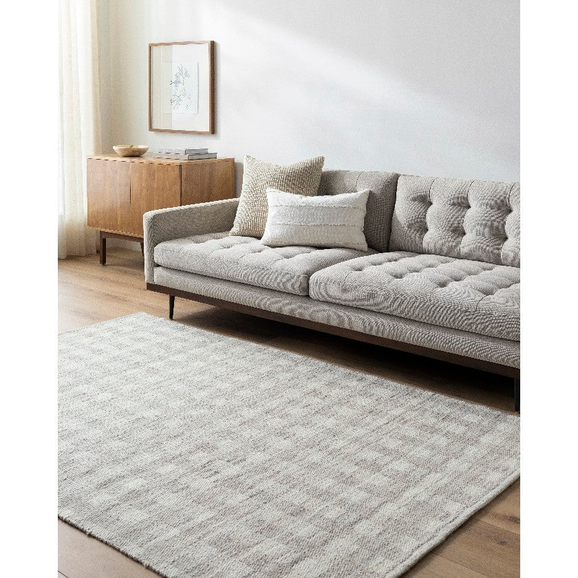 Jamaris Solid and Border Medium Brown Area Rug
