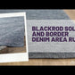 Blackrod Solid and Border Denim Area Rug